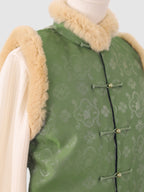 Close-up of the upper part of the vest showing jacquard texture and fur collar