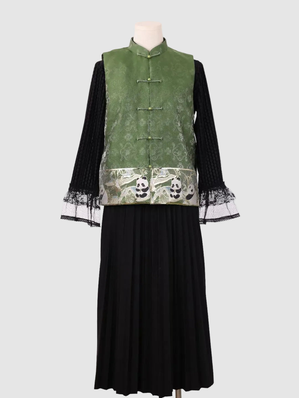 Front view of the green jacquard vest, no fur trim and no padded lining version