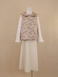 Front view of persimmon and cat print vest with rounded collar and frog buttons
