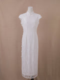 White lace wedding qipao cheongsam, ankle-length with mandarin collar, floral lace, and pearl side closure – front view.